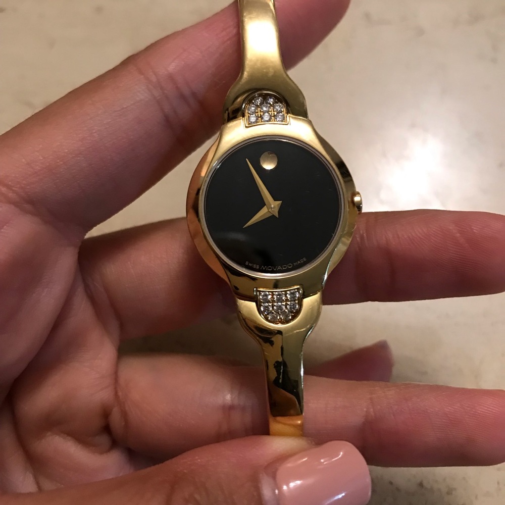 Gold Movado watch- no scratches on face